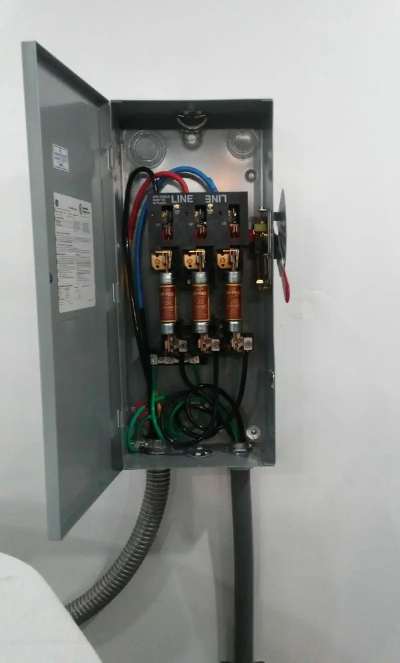 Three-phase disconnect switch installed for Smoke Detector Installation in Lloyd Harbor